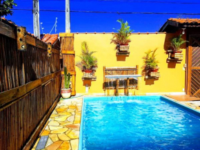 Casa linda com Piscina e Jogos, pertinho da Praia